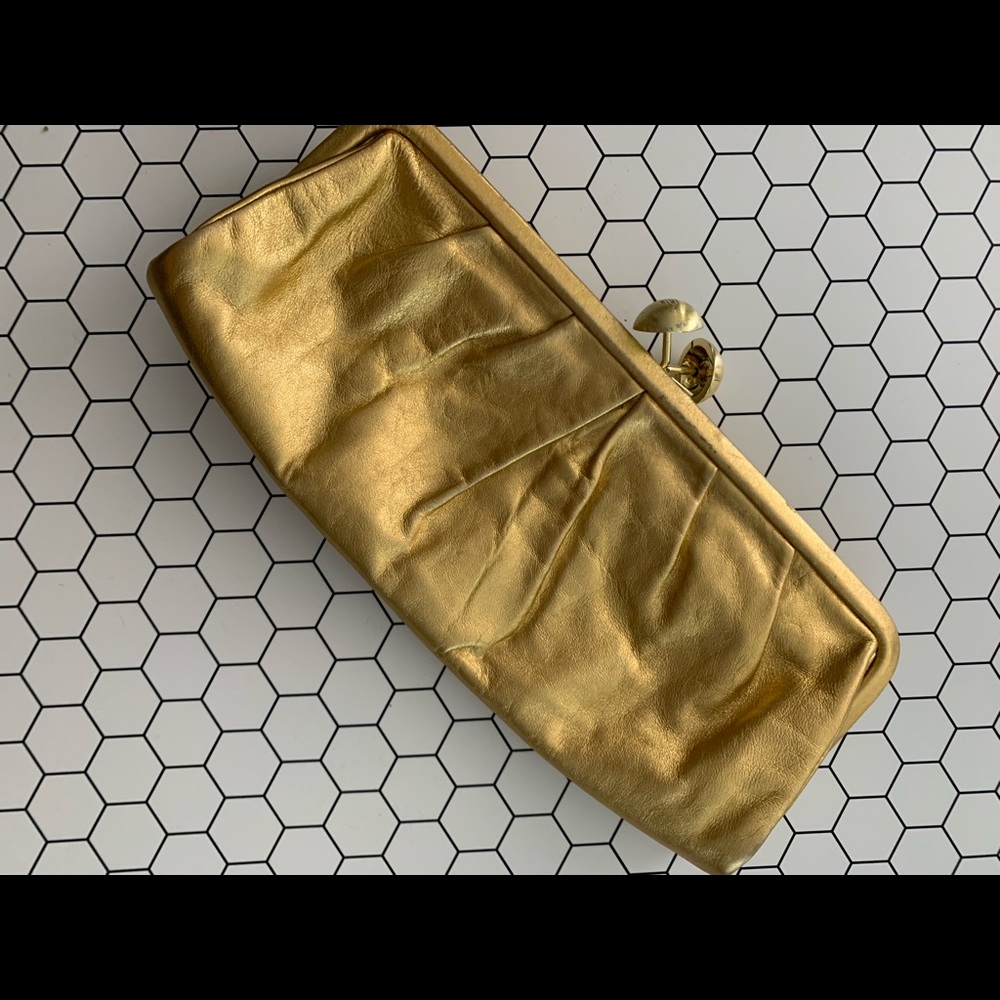 Vintage gold coach clutch